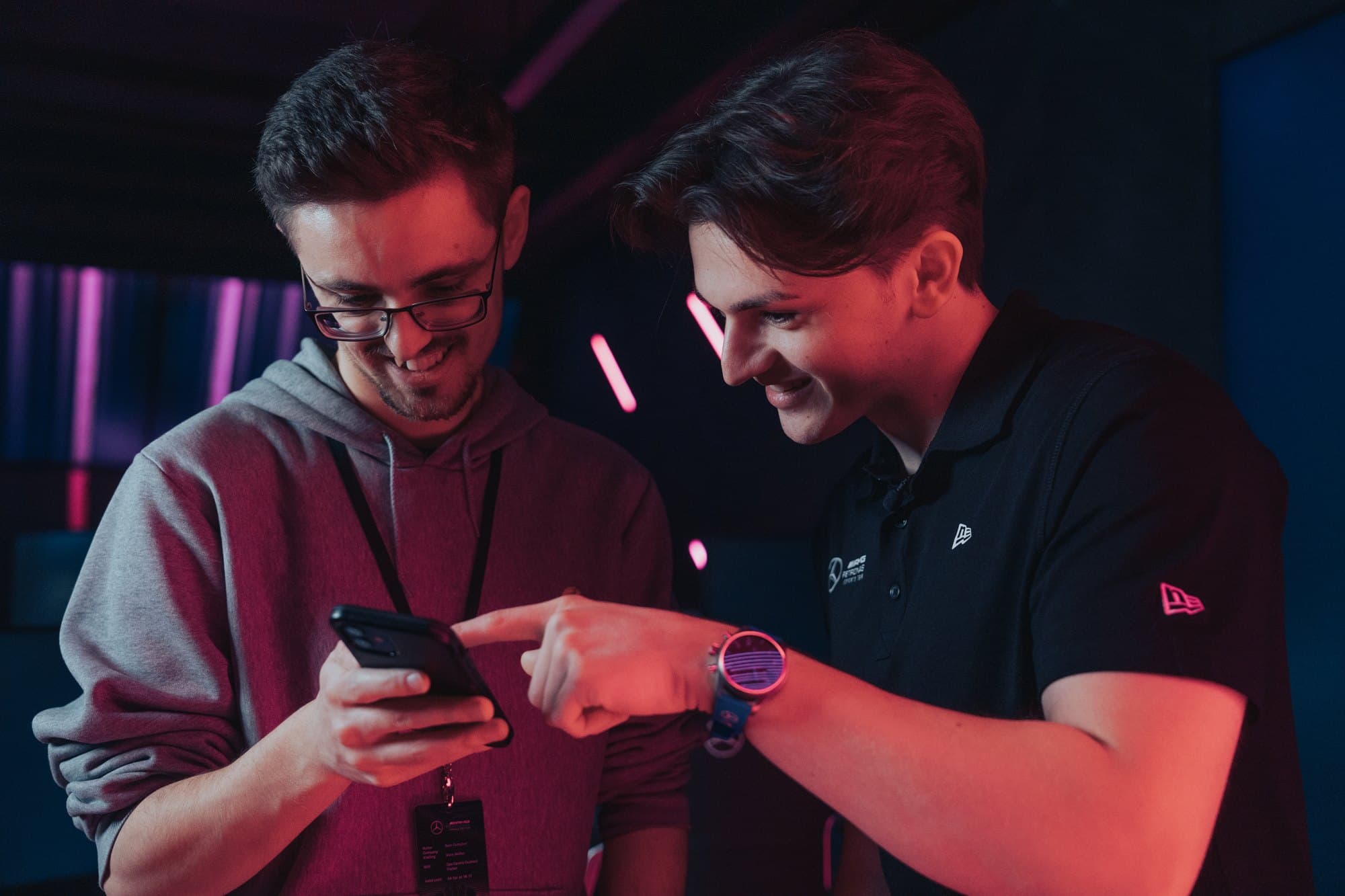 Marcel Kiefer and an engineer looking at a phone together