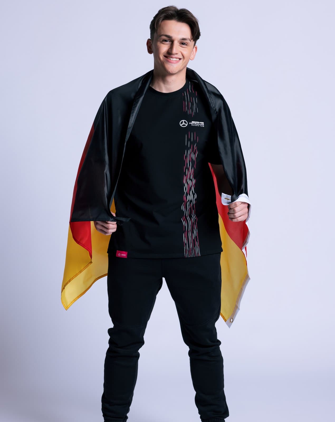 Marcel Kiefer with a German flag over his shoulders